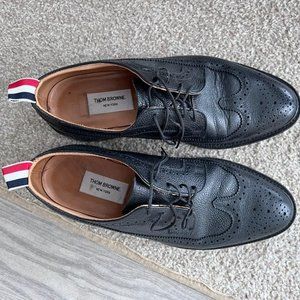 Classic Thom Brown black pebble grain longwing brogue with leather sole